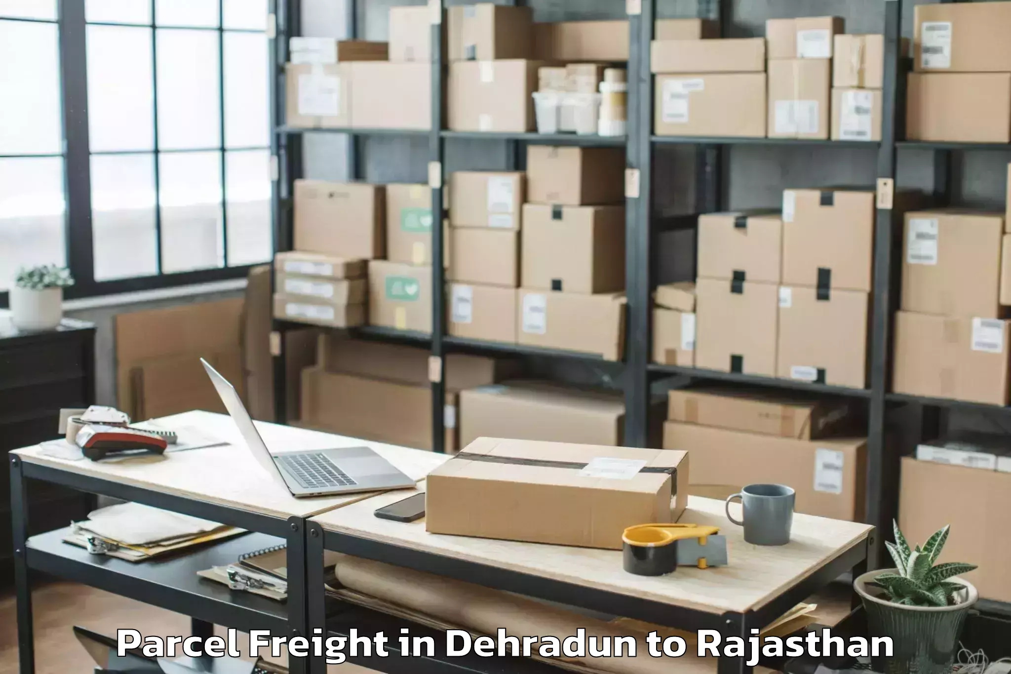 Top Dehradun to Mewar University Chittorgarh Parcel Freight Available